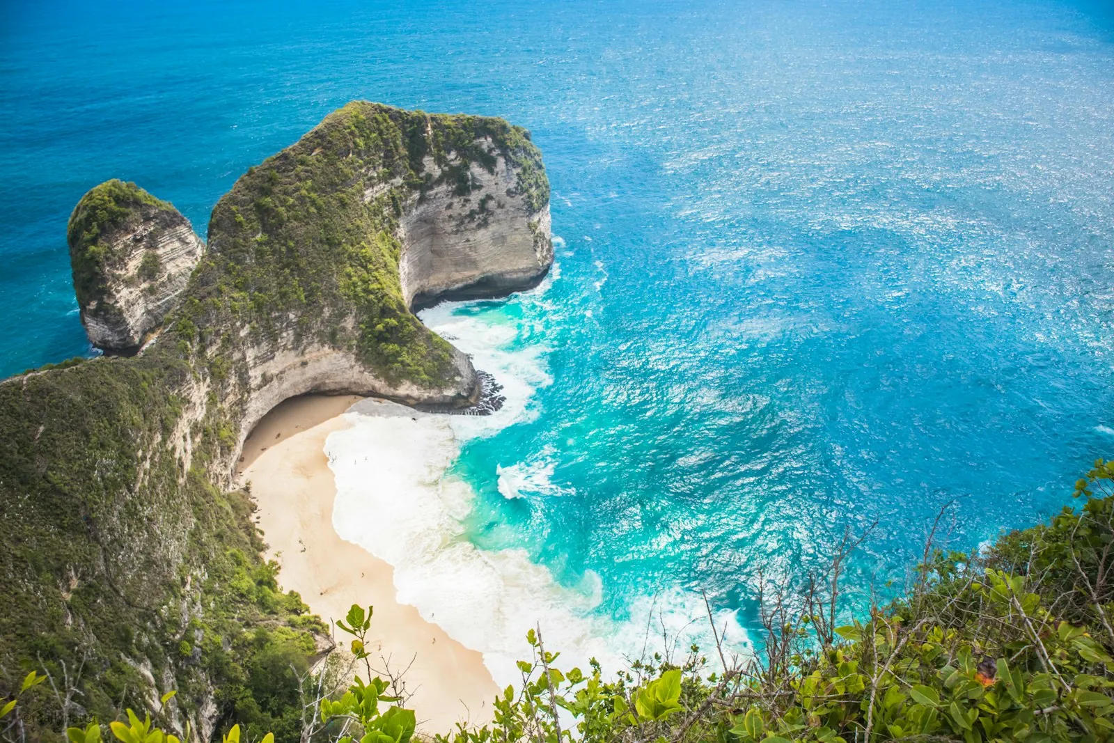 Aerial view of the iconic T-Rex shaped Kelingking Beach cliff on Nusa Penida, Indonesia