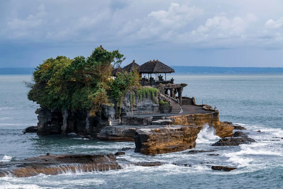Tanah Lot temple perched on a sea-rock formation, Bali, Indonesia