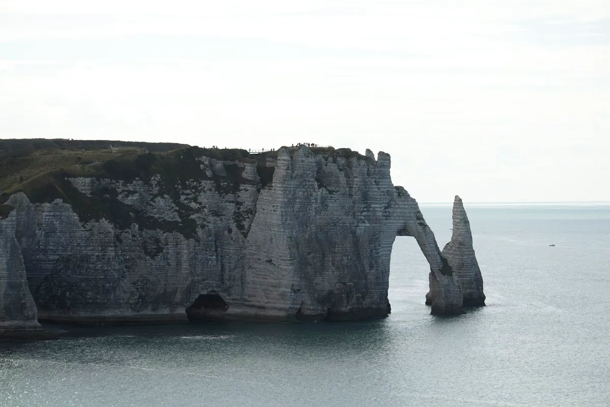 Rocky arch cliff formation on the Etretat coast, Normandy