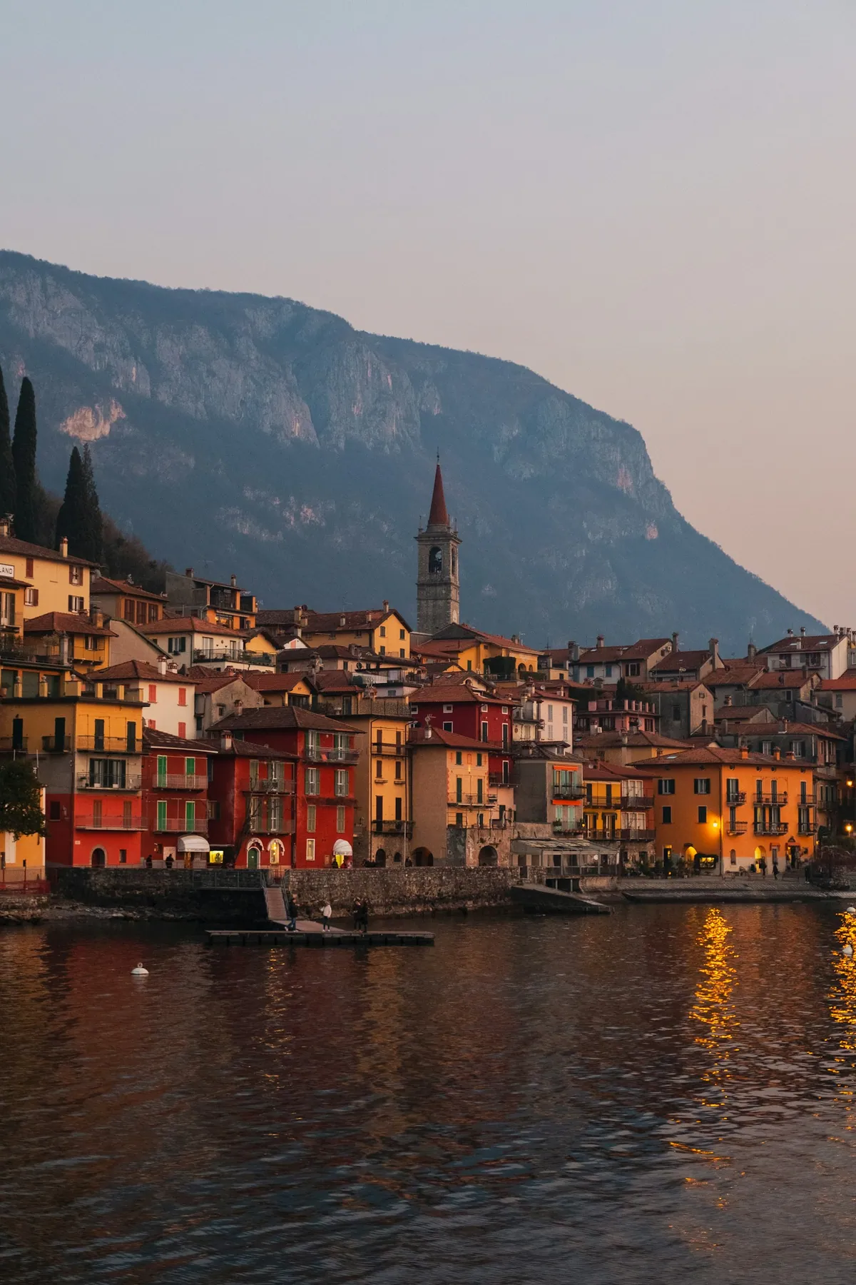 Waterfront of Varenna on Lake Como under blue sky
