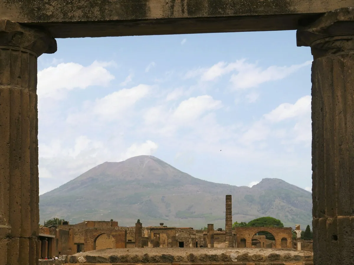 Pompeii ruins with Mount Vesuvius rising in the background