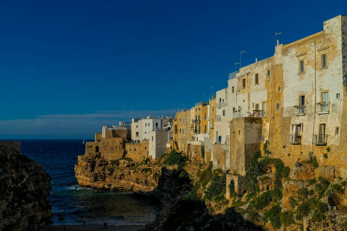 Cliffside houses above the sea at Polignano a Mare Puglia
