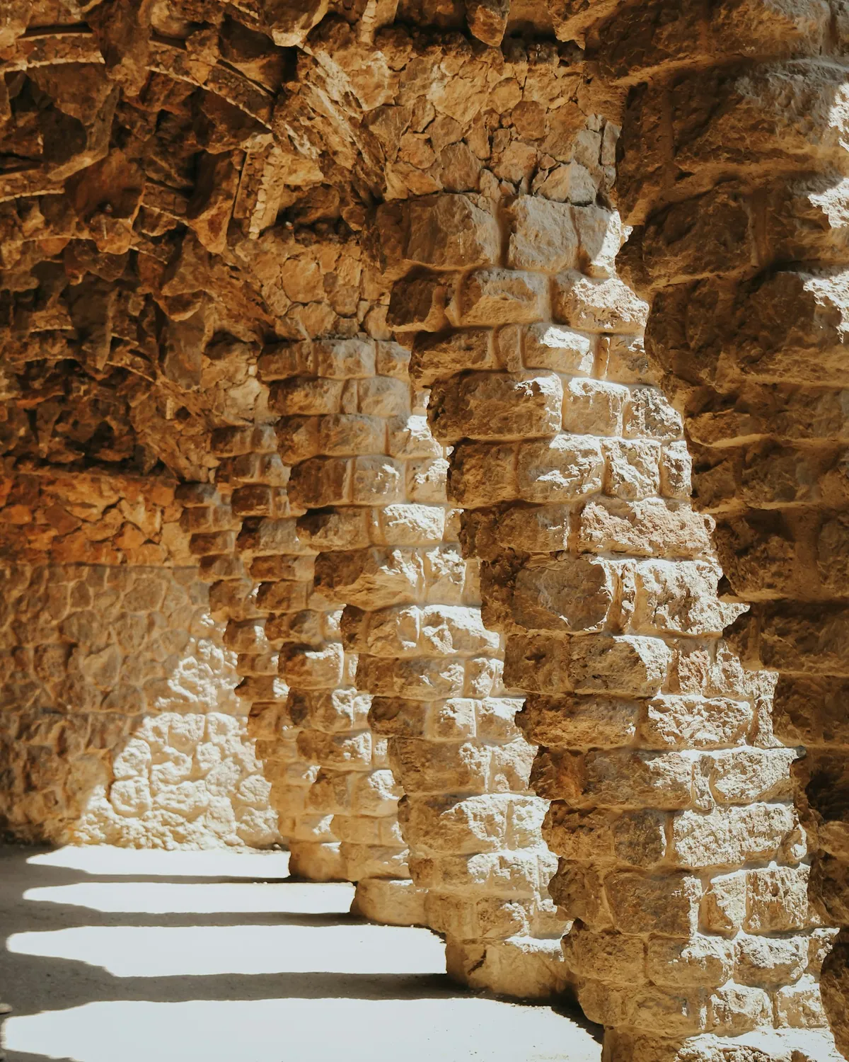 Mosaic columns in a passageway at Park Guell, Barcelona