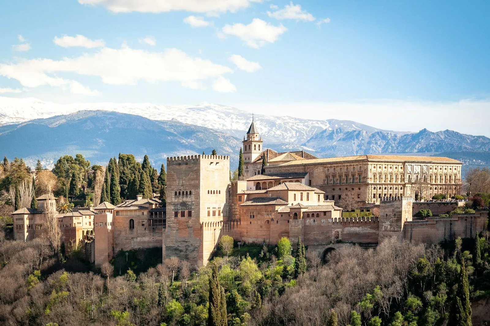 Aerial view of the Alhambra palace and snow-capped Sierra Nevada, Granada